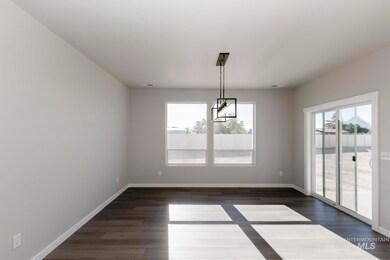 Unfurnished dining area featuring dark wood-type flooring
