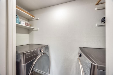 Laundry room with washer and dryer