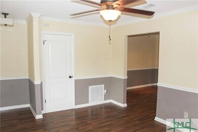 Living room leads to great dining area.