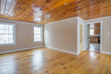 Large, light-filled living room with...