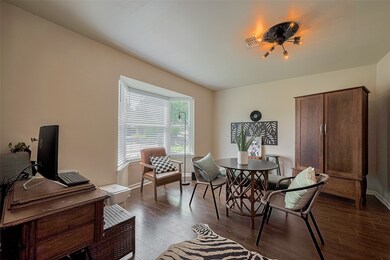 Front room, currently set up as an in home office