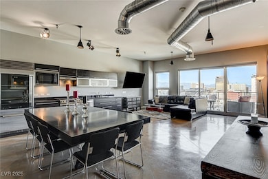 Kitchen featuring visible vents, a sink, and built