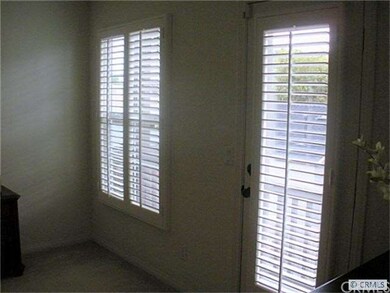 Custom shutters and door to patio