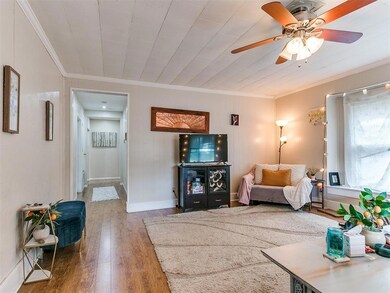 Living room featuring hardwood / wood-style floori