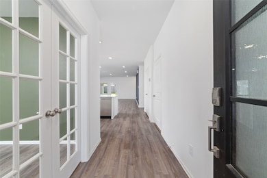 Welcome in! This bright, inviting entryway with el