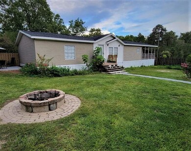 Back of house with Firepit
