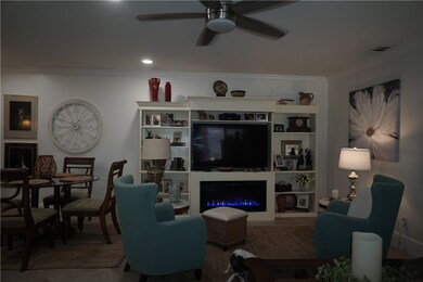 Walk in to a large living room. Entire home has ti