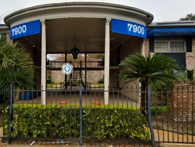 Welcoming grand entry with signature blue awnings