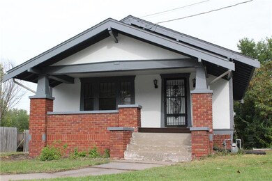 Front of Home has a large front porch to enjoy you