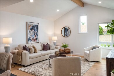 Front room with vaulted ceilings.