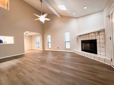 Living room w/ skylights and new LVP flooring