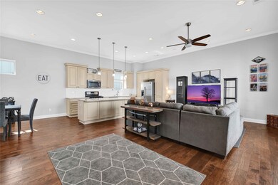2nd floor boasts the living and kitchen area.