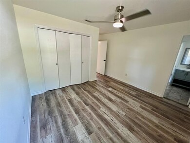 Unfurnished bedroom featuring wood finished floor