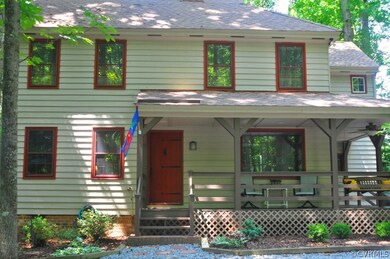 Wrap around front porch w/ 2 entrances.