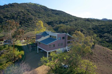 Side view, w/carport + 3 car garage