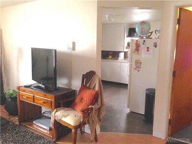 Kitchen Lower level picture from living room to ki