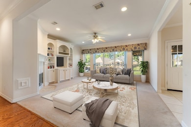Living Room with gas log fireplace and builtins