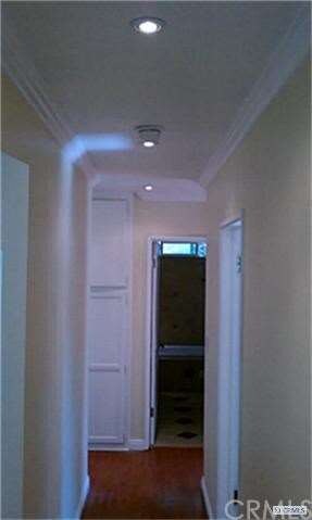 Hall to 3 Bedrooms w/Recessed Lights and Laminate 