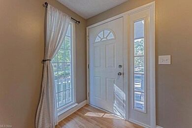 Entrance foyer featuring light hardwood flooring a