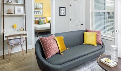 Living area with wood-type flooring