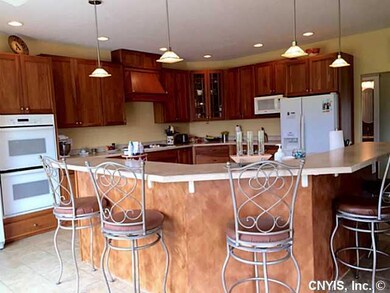 Kitchen Custom center island with built in dbl sin
