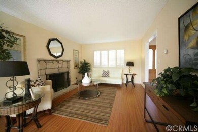 Livingroom with one of TWO fireplaces downstairs