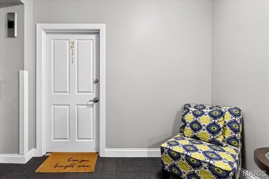 Living area featuring baseboards