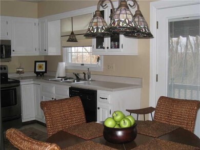 Kitchen. Spacious kitchen opens to dining. French 