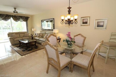 Tiled dining room with ceiling fan with notable ch