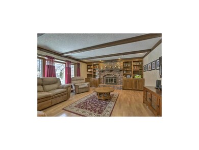 beautiful family room with warm inviting fireplace