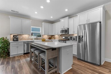 Opens to the Living Room, has  recessed lighting, 