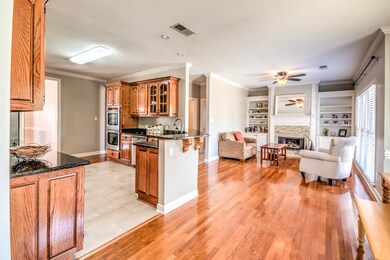 Notice the open and airy space...the kitchen, brea