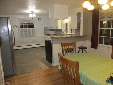 View of dining room and kitchen