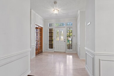 View of Front Door looking from the Family Room