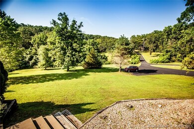 View of front yard and additional parking.