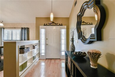 Welcome! Foyer with built in shelving.