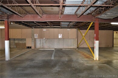 Two covered parking spots only steps from entrance