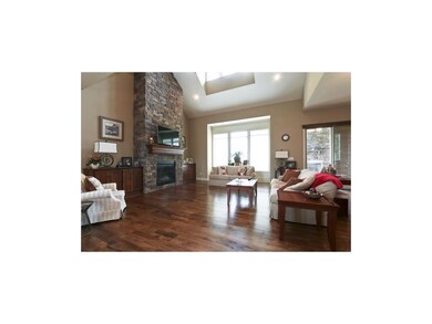 Soaring Great Room with Custom Wood Floors!