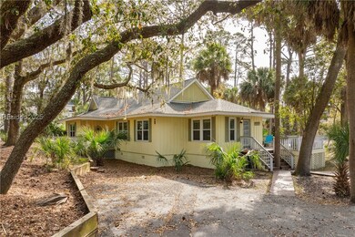 Front view of home with large & spacious driveway