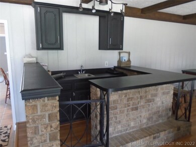 Wetbar in the den makes entertaining easy!