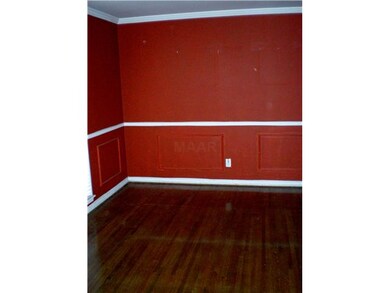 SPACIOUS DINING ROOM W/ HARDWOOD FLOORS AND FRENCH
