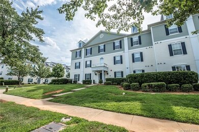 Front of building, curb appeal abounds and sidewal