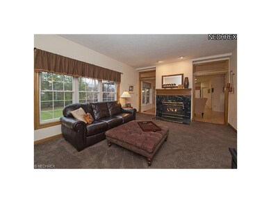 Family Room with see-through fireplace adjoins Kit
