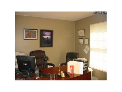 The fift bedroom, located on the main level is cur