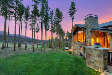 Yard at dusk with a yard and a mountain view