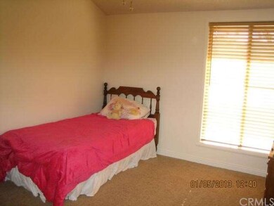 Aprox. 9x10 second bedroom with mirrored closet do
