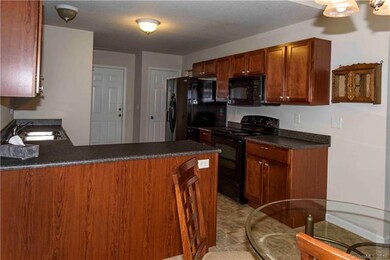 This open floor plan kitchen offers beautifully ma