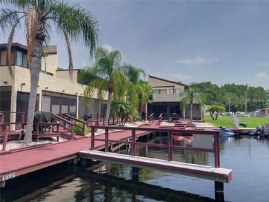 Dock runs along the back of the building, boat sli