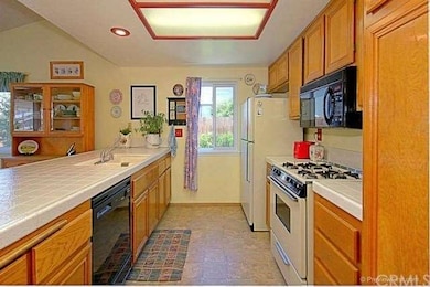 Full view of kitchen.  Microwave will be replaced,
