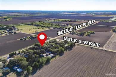 Aerial view of sparsely populated area with extensive farmland